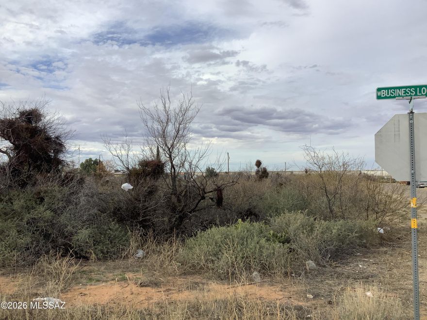 This is a double lot that has great frontage of the entire block access on N. Riggs Ave in between W I10 Business Loop to the South & E Kinchilla Street to the North.  There is electric to the lot line at the Alley Access and beautiful mountain views. This is a perfect place to build a home or maybe start a business.