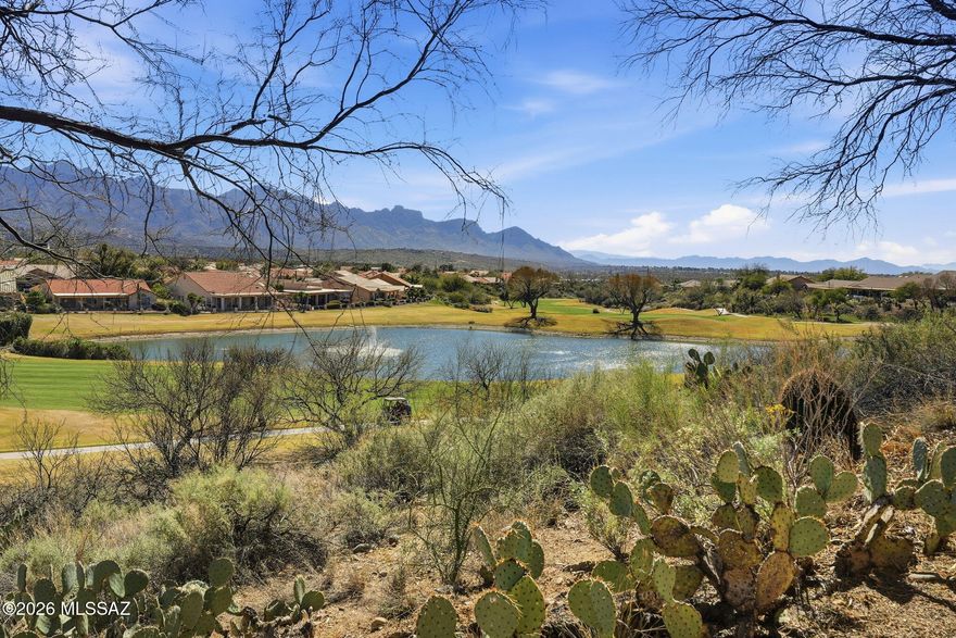 Incredible mountain and golf course views  from inside and out back define this SaddleBrooke Estancia model with casita, ideally positioned on a premium elevated lot. Showcasing timeless Santa Fe architecture, this residence offers 2 bedrooms (casita included), 2.5 baths, a dedicated office, and an inviting Arizona Room designed for year-round enjoyment. The private courtyard with fountain provides a striking first impression, while dining room and bright breakfast nook provide flexible entertaining options. The spacious primary suite offers fabulous views. And the well-appointed casita ensures comfort and privacy for guests. Unwind in the hot tub and savor fresh lemons from your own tree. An exceptional blend of views, design, and refined desert living.