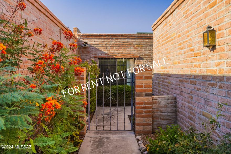 Built 1980- Tucked away on a quiet, hidden street in the desirable Fairfield Community, this burnt adobe townhome features 2 BED 2 BATH - 1364 sq. ft., court yard entry, carpet and ceramic, Living and Dining area with cozy fireplace, slider doors from living room and master bedroom to the back patio with views. Large kitchen with eat-in area. Appliances included: SS New Refrigerator, Stove/Oven with Built-in Microwave combo unit, Dishwasher, Laundry room with Washer/Dryer, oversized garage. Community Pool. Pets are subject to approval - Dogs only. **Please visit our website for SECURITY DEPOSIT, PET RENT, & NON-REFUNDABLE PET FEE INFORMATION.