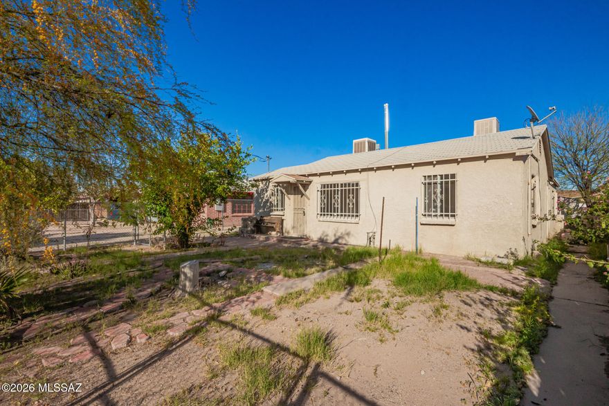 Single-story property offers a strong opportunity for investors, renovators, or buyers looking to add value. Located on a quiet cul-de-sac in South Tucson, the home features 3 bedrooms and 2 bathrooms and is currently vacant, making it ready for renovation or redevelopment. Conveniently situated just one block from Pueblo High School and close to nearby amenities, the location adds to its long-term potential. An existing concrete foundation in the backyard, originally intended for a future room addition, provides added flexibility for expansion. With the right vision and improvements, this property offers excellent upside.