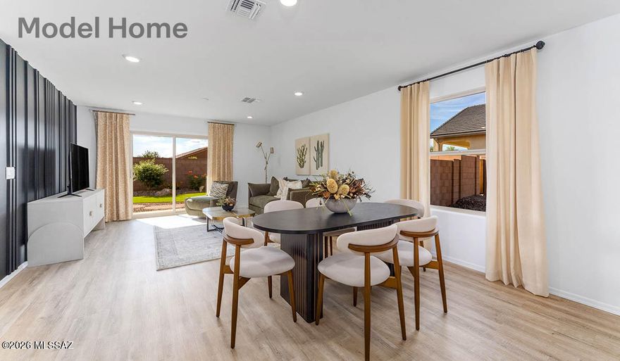 Welcome to the Carolina floor plan in the desirable Entrada del Toro community in Sahuarita! This single-story home offers 3 bedrooms, 2 bathrooms, and 1,608 sqft. of open-concept living. The spacious great room flows into the kitchen and dining area, perfect for everyday living and entertaining. Enjoy a resort-like lifestyle with pools, splash pad, 10-acre lake, recreation center, basketball and pickleball courts, plus parks, walking paths, and scenic mountain views. All just minutes from shopping, dining, and I-19!