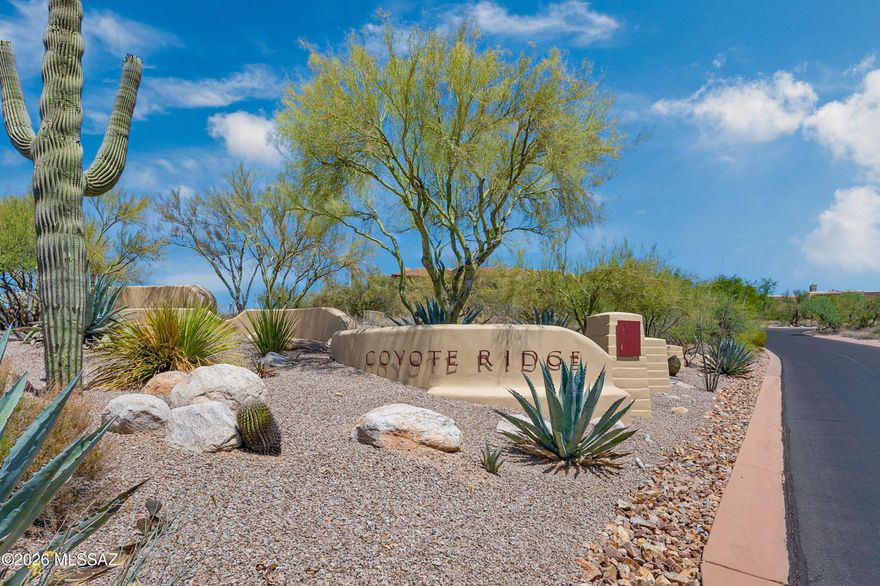 One of the few exceptional remaining custom lots in Oro Valley. This 1.86-acre custom homesite in Coyote Ridge has an elevated setting with stunning Catalina Mountain, Pusch Ridge, sunset, and city-light views. A generous building envelope offers ample room for a luxury custom residence, with guest accommodations, extra garage space, and/or resort-style outdoor living spaces. Surrounded by beautiful desert vegetation and upscale custom homes, this rare parcel combines privacy, natural beauty, and convenience just minutes from Oro Valley's shopping, dining, golf, and recreation opportunities. Build the custom home you've always envisioned on one of Oro Valley's premier lots.