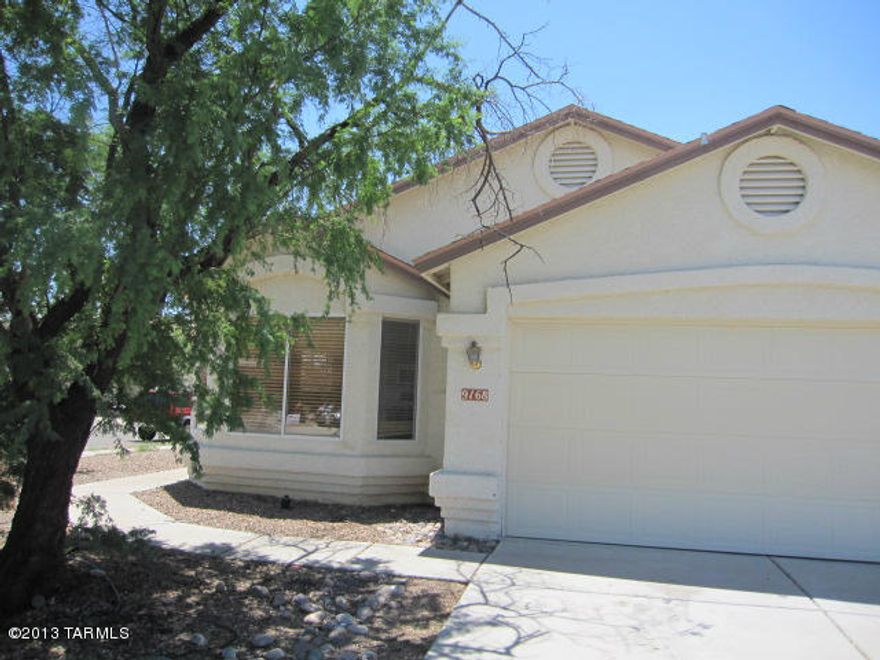 3BR 2BA with Tile and Wood flooring throughout. Large Kitchen has Breakfast Nook area and Bar. Extra Storage Pantry. All Kitchen appliances included. Separate Formal Dining Area off Kitchen. Fireplace in Family Room with Display Shelf. Spacious Master Suite w/Garden Tub and separate Shower. Dual Vanities. Extra Large Walk-in Master Closet. Big block walled in backyard with Covered Patio. 2 Car Garage. Washer /Dryer Hook ups. Central AC.