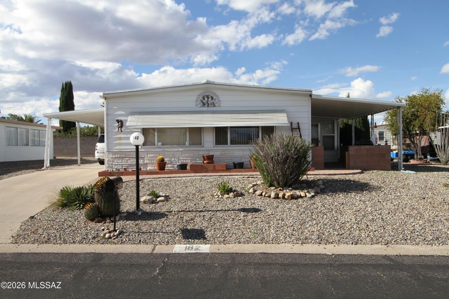 Mountain Views,  Move in Ready, 2 Bed 2 Bath mobile home in desirable Pueblo Estate.  Southwestern Charm, Living room has sliding door out to a covered Patio with Great Views.  Kitchen has plenty of cabinet space, with bar area.  Spacious Primary  Bedroom has a full walk in closet.  Well sized 2 Bedroom.  Arizona Room not included in Sq footage.  Large workshop off Carport.  Furnace - AC unit new 11/2022.   HOA includes recreation facilities, heated pool, Hot Tub, library, ceramics, billards, exercise rooms, shuffleboard, card games, Bingo and much more.