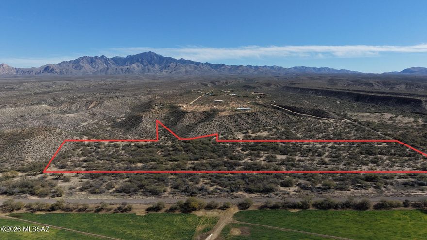 Beautiful level, usable 16.79 acres+/- acres full of mature mesquite trees. Great soil for planting and your horses. Can be subdivided.  Shallow water table for your well. Excellent seller financing available with 30% down, 7% interest, 25 year amortization and 3 year balloon. Very rare opportunity. Seller is a licensed real estate broker in the State of Arizona.