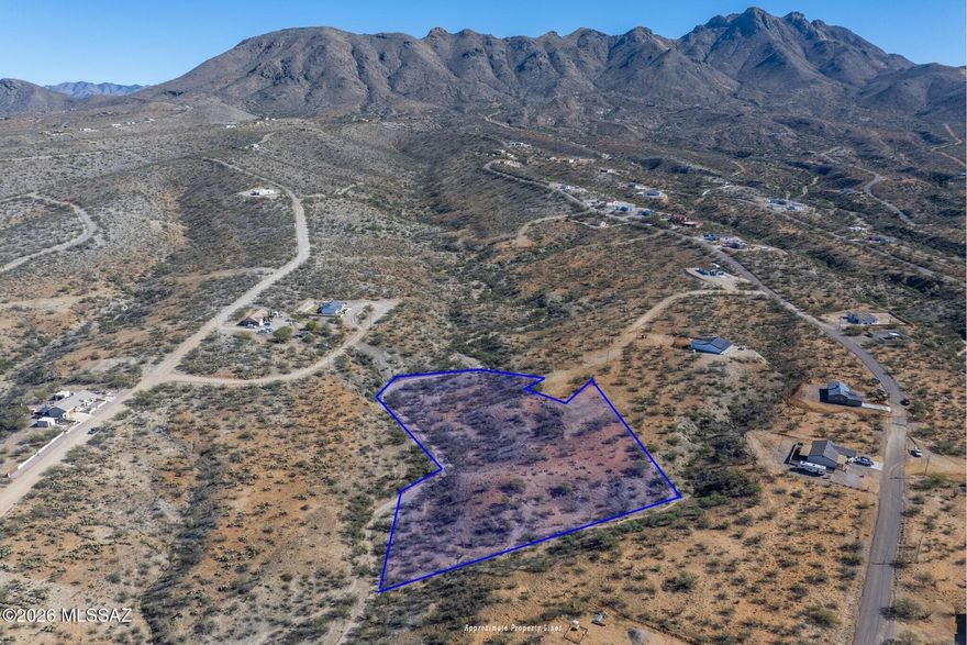 Discover the perfect opportunity to build your dream home in the beautiful Rio Rico Ranchettes. The spacious 4.97 acres of peaceful desert living. Nestled in a quiet cul-de-sac with scenic mountain views. The property provides ample space for a custom residence, guest home, or private retreat. Enjoy the serenity of Rio Rico's natural surroundings while remaining just a short drive from charming shops, art galleries, restaurants, and golf courses. Whether you're seeking a full-time residence or a seasonal getaway, this spacious double lot provides the ideal setting to bring your vision to life in one of southern Arizona's most picturesque communities.