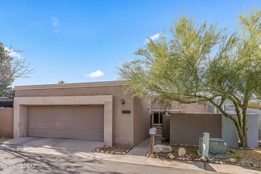 Perfect for those who crave city convenience without sacrificing serenity, this near downtown home w/ multiple bonus spaces offers bright, open-concept living . Think 3bed/den/sun room/2bath/great room floorplan. Recent improvements including a new roof & windows add peace of mind & long-term value, while the home's overall presentation feels clean, welcoming, and move-in ready. The interior is both spacious and sophisticated with tile floors throughout, stainless steel appliances,  marble shower surrounds & interior laundry room. Two additional enclosed rooms not included in total square footage Additionally, it features a rare-for-the-area 2-car garage! Step outside and enjoy a location that puts you minutes from downtown Tucson, 4th Avenue, the Mercado District, Tumamoc Hill, the UofA, and I-10 fwy access.  Click on ''more'' for balance of description. Whether you're heading out for dinner, exploring local culture, or enjoying the mountain views and desert surroundings, this home offers a lifestyle that is both connected and comfortable. A great opportunity to own a well-positioned property with modern appeal and lasting value.