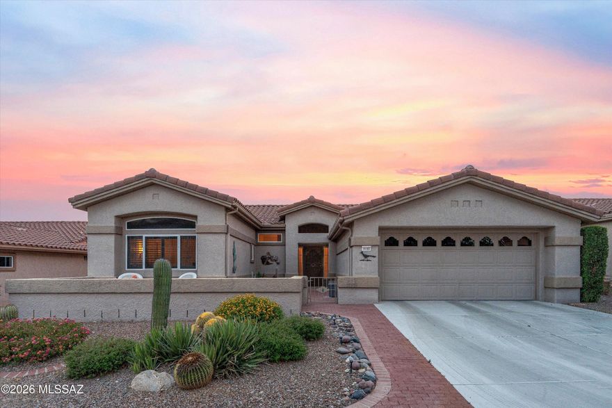 Desirable Windsor Model 2BD/2BA +Den in desirable Sun City. Spacious open living room, high ceilings, freshly painted inside, large picture windows, oversized dining area, 16 X 16 tile in all traffic areas, Chef's kitchen, wraparound counter, oak cabinetry, built-in wine rack, Corian counter-tops, breakfast bar, sitting area/TV room with fabulous view to common area.  Master Suite with a large bay window with built-in storage, access to a covered patio, 2 master closets, and an upgraded shower. Den with two custom-built-in desks, plenty of room for working or crafting. Backyard features an extended patio with a pergola awning, backs up to a common area, and has views. The Courtyard has fabulous views of Pusch Ridge. Retirement Golf community, which is highly sought after.