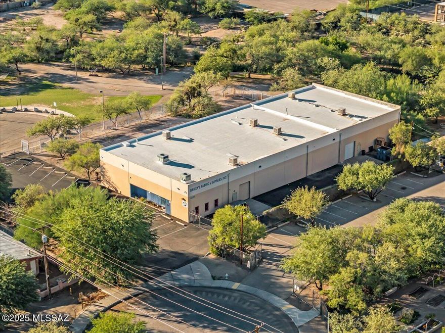 Perfect for Gem Show! Unlock the potential of this versatile commercial warehouse property, ideally suited for a wide range of business operations. Whether you're looking for a space to expand your company, launch a new venture, or secure a solid investment, this property offers both functionality and flexibility in an excellent location. Featuring a spacious warehouse floor plan with high ceilings and ample power, the property is designed to accommodate manufacturing, storage, distribution, or specialized trades. Multiple access points and tall doors provide easy loading and unloading, while the large lot allows for generous parking and truck maneuverability. The site offers excellent accessibility to major roadways, making it convenient for suppliers, customers, and employees alike. Room to grow on west side of building. Also has a beautiful mural on building.  Park next door. 
Currently being utilized as a fabric supply warehouse, but the potential is unlimited.