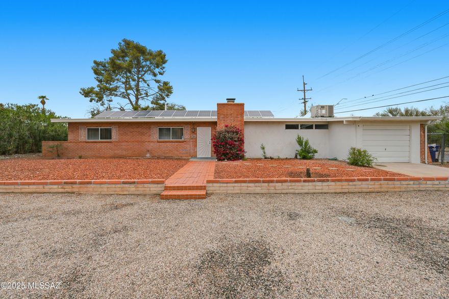 Update home in the desirable Green Hills Neighborhood. 5 bedrooms and 3 bathrooms, New kitchen, living room with cozy wood-burning fire place. No carpet, modern ceramic tile in the main areas and porcelain wood-plank in the master bedroom and two guest bedrooms; energy-efficient solar through TEP's program. Call me to schedule showings !!!!