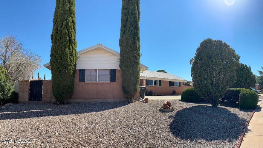 Welcome to this well-maintained 3-bedroom, 2-bath home offering 2,084 sq. ft. in the highly sought-after Kings Manor subdivision of Sierra Vista. Conveniently located near shopping, dining, and the local hospital, this home features a decorative wrought iron security entry and numerous upgrades throughout. Enjoy updated quartz countertops (2017), modern appliances (2018), beautiful flooring (2019), reverse osmosis system, tankless water heater, and a washer and dryer installed in 2022. Combining comfort, style, and convenience, this move-in-ready home is an outstanding opportunity in one of Sierra Vista's most desirable neighborhoods. Schedule your showing today!