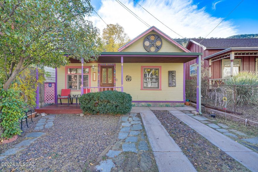 Elegant & Upgraded home PLUS Full Guesthouse/Studio/Office or RENTAL! 2 private parking spaces & NO stairs - located in the heart of Beautiful Old Bisbee! Close to every wonderful thing that Bisbee offers, just park your car and enjoy life! A low-care & tranquil private courtyard separates the main house from the guesthouse studio, which is * A DREAM SCENARIO* for a private office or long-term rentals/ short term Air B & B or a family member that needs their own space!  Did I mention PRIVATE Parking for up to 2 small cars in the front & ONLY entry patio steps *** Perfect for anyone looking to relocate to Bisbee full-time as well & with a location that is unsurpassed! ... more next page: The main house has 2 large bedrooms, 1 bathroom, laundry room and wonderful light and bright great room / kitchen floor plan! PLUS Fabulous 325 square foot Studio with a full kitchen & bathroom and private yard. 

PERFECT HOME for entertaining - PARKING is on the property in the front yard and offers 2 spaces for smaller cars plus many open spaces of street parking for your guests. This lovely Historic home is just a very short walk to all that Old Bisbee offers! No need for driving - restaurants, shops and music are just a stone's throw and light walk away. 

The property is tucked back far enough for peace & quiet even during the busiest of weekends. 
Sellers have added many recent upgrades.
The location and parking alone give so much value, but the condition of the main home and the guest home are outstanding and even more reason for fall in L-O-V-E with this BEAUTY!!  

Welcome Home to one of the sweetest properties in Old Bisbee!
