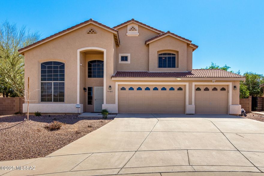 Stunning 2-story gem with mountain views! This gorgeous home boasts a 3-car garage w/attached cabinets for extra storage. Discover wood-look and tile flooring in all the right places, clerestory windows, & soaring vaulted ceilings. The inviting living/dining area flows seamlessly into the great room, where a cozy gas fireplace sets the perfect ambiance for gatherings. Well-appointed kitchen features SS appliances, ample counter space, wood cabinetry, built-in desk, & center island w/breakfast bar. Spacious main bedroom offers a versatile sitting area, a private balcony access, & an ensuite w/two vanities & walk-in closet. Enjoy breathtaking mountain views from the balcony or relax in the backyard oasis, complete with covered patio, sparkling pool, & soothing spa. Don't miss this home!!