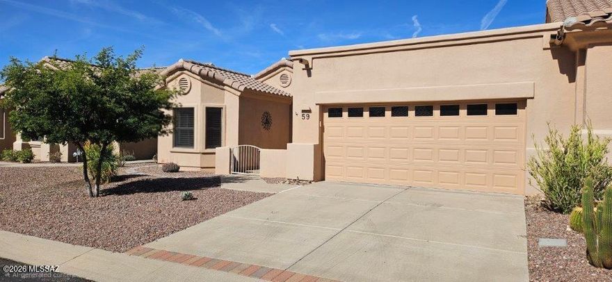 Retire in Style!

2-bedroom plus den/office, 2 bath townhome/condo with NEW ROOF April 2026 in Vistoso Village Unit #59, the largest floorplan available! 1,851 sq ft.

Monthly HOA fee includes water, roof, exterior paint, all exterior maintenance front and rear, Xfinity cable tv, termite treatment, year-round heated community pool. spa and lap pool, clubhouse, hobby activities, barbeque grills and more! 

Street maintenance, Brush and Bulky pickup and more!  

This is a lock and leave, gated, adult 55 and older community. Secure, safe and quiet! Spotless and move in ready. TV in master BR stays as does two bar stools. Solar tube lights in great room and laundry. YOUR NEXT CHAPTER BEGINS IN A WELCOMING, VIBRANT COMMUNITY DEDICATED TO MAKING LIFE FUN, FULFILLING ANDFULL OF OPPORTUNITIES! 

VISTOSO VILLAGE: A VIBRANT 55+ACTIVE ADULT COMMUNITY
Located in picturesque Oro Valley, Vistoso Village is an intimate, lock-and-leave gated community offering an unparalleled living experience for active adults.  With just 263 homes, and 5 different appealing models, our residents enjoy a peaceful, private setting with the opportunity to participate in a variety of engaging activities. Vistoso Village fosters a vibrant, friendly atmosphere where residents can connect, create and thrive!


This pristine home, located in gated, age restricted, well-manicured, very desirable Vistoso Village in Oro Valley. This property, 1,851 sq ft home, the largest floorplan, rarely available, has two bedrooms with den/office, two bathrooms and a spacious bright, open great room. Looking out from the kitchen, you can enjoy family and guests as you prepare a meal.

Enjoy fresh air and quiet splendor in the entry courtyard. The home has vaulted ceilings, large windows with Plantation Shutters, neutral tile combined with a breakfast nook and bar!

Granite countertops throughout, even in the laundry room with a utility sink, make laundry day a snap.

The rear covered patio with a shade awning, remote and a ceiling fan, make relishing patio time a priority. Garage has built-in-storage cabinets.

The HOA monthly fee of $524, includes water, a community lap pool, regular pool, spa and hot tub, clubhouse, exterior maintenance, recreation room library, termite treatment every five years.

ON-SITE MANAGEMENT STAFF

HEATED RECREATION & LAP

POOLS and HOT TUB 

SHADED OUTDOOR SEATING WITH PROPANE GRILLS

CLUBHOUSE WITH MULTI FUNCTIONAL SPACES   

FITNESS CENTER WITH SHOWERS

CARD/CRAFTS ROOM

LIBRARY

BILLIARDS/TABLE TENNIS ROOM

EXPANSIVE PARTY/DINING ROOM 

FULL KITCHEN FACILITIES

MEDIA ROOM WITH EXTRA LARGE SCREEN TV

EXTENSIVE HOA SERVICES:

IN ADDITION TO ALL OF OUR TOP-NOTCH FACILITIES, AMENITIES AND DAILY ON-SITE PROFESSIONAL MANAGEMENT! 

OUR MONTHLY HOA FEES CURRENTLY
INCLUDE: 

ROOF REPAIR/REPLACEMENT 

RANCHO VISTOSO RECREATIONAL OUTDOOR FACILITIES 

HOME EXTERIOR PAINT 

XFINITY INTERNET/TV CABLE

PROFESSIONAL LANDSCAPING-YARDS AND COMMUNITY SPACES

COMPREHENSIVE EXTERIOR FEATURES

INSECT/PEST CONTROL 

STREET MAINTENANCE AND REPAIR

WATER AND SEWER

TRASH/RECYCLING PLUS BULK PICKUP

EVEN MORE!!!!

COMMUNITY SPIRIT & ACTIVITIES: 
Exercise and social events, currently
including: 
Aerobics and Water Aerobics
Games such as Mexican Train,
Mahjongg, Cornhole & Poker
Pickleball Club 
Yoga
Billiards/Table Tennis 
Book Club
Line Dancing 
Handcrafters Group
Golf Leagues
Hiking Groups
Concerts/Speakers 
Walking/Museum Tours
Friday Social Hour 
Village Newsletter
Community Website  
Men's Breakfast Group
Women's Breakfast Group 
Annual Community Events such as the
Pet Parade, St. Patrick's Day Party, Spring
Luncheon, Soup & Chili Cook-Off,
Halloween Happy Hour, Thanksgiving
Dinner, Christmas Caroling and our New
Year's Eve Gala
Seasonal Village Breakfasts
Planned AND Impromptu Pool Parties
Summer Survivor Pop-up Events