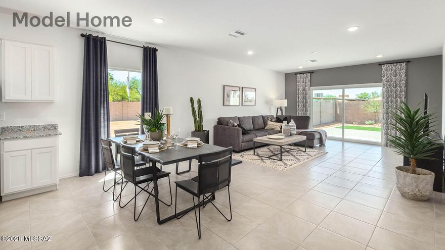 Step into The Gaven, a thoughtfully designed single-story new home nestled within the inviting Saguaro Bloom community. With 1,815 square feet of living space, this home offers four bedrooms and two bathrooms, ideal for those seeking a blend of functionality and modern style.
As you enter through the front porch, the foyer opens up to reveal a spacious and open layout that flows seamlessly from the entryway to the living areas. The great room serves as the heart of the home, connecting effortlessly to the dining area and kitchen, making it a perfect space for both relaxation and entertaining Our most energy efficient ZERO ENERGY READY home with spray foam insulation, tankless water heater, solar prewire and energy star rated appliances.