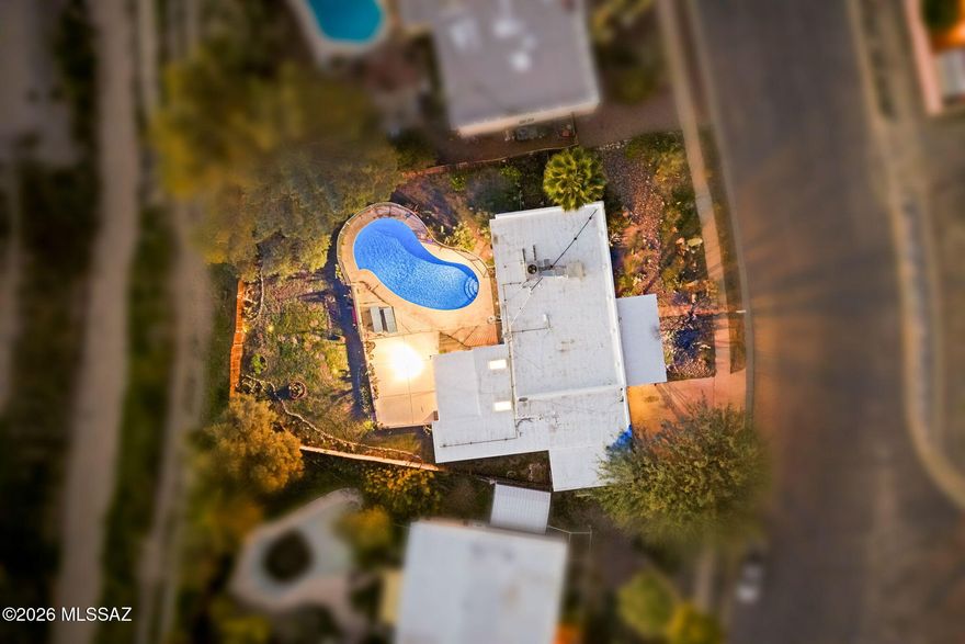 Situated on an almost quarter-acre lot with no HOA, this versatile east side property offers space, flexibility, and major backyard appeal! Enjoy a sparkling enclosed pool, oversized yard with room to entertain, and a bonus room ideal as a 4th bedroom, game room, office, or additional living space. Added improvements are underway since the prior sale including a roof recoating, providing added peace of mind for the next owner. Conveniently located with plenty of room to make it your own, this property combines functionality, outdoor living, and value in one package. Call to schedule a tour.