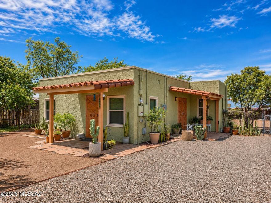 Authentic Southwestern charm meets peaceful desert living in this beautifully maintained adobe-style retreat. Featuring classic green stucco, terracotta accents, covered patios, and curated desert landscaping, this home offers warmth, character, and inviting curb appeal. Inside, natural light and cozy living spaces create a welcoming atmosphere full of personality. The spacious lot provides privacy, room to entertain, garden, or simply enjoy Arizona's breathtaking sunsets and starry skies. Perfect as a full-time residence, winter getaway, artistic retreat, or investment opportunity, this unique property captures the true essence of the Southwest lifestyle.