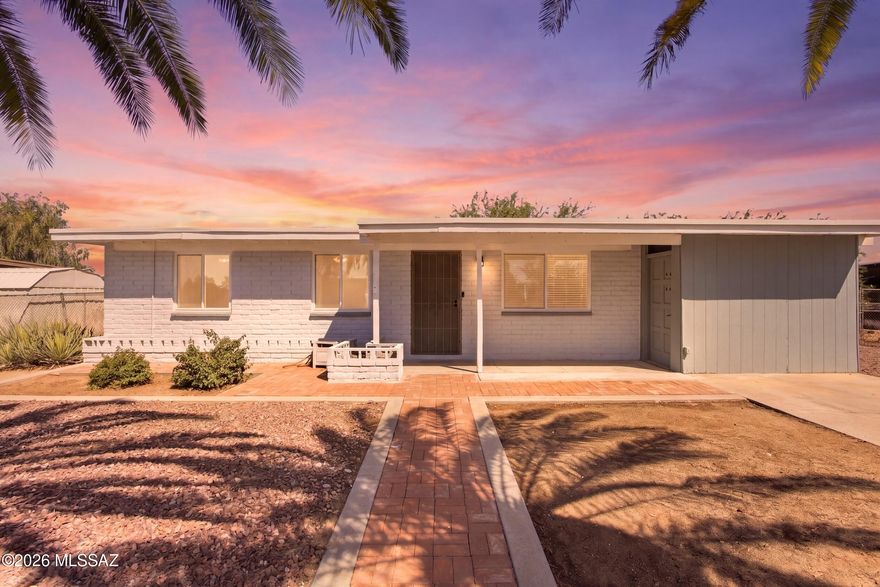 Welcome home. Beautifully updated 3 bed/2 bath Eastside property on a large lot with NO HOA--room for vehicles, toys, and more. Spacious layout includes a separate living room upon entry plus an oversized family/flex space with mini-split, ideal for a home office, gym, media room, or additional living area.

Recent improvements include LVP flooring, dual-pane windows with updated blinds, fresh interior paint, upgraded doors and trim, recessed lighting, ceiling fans, upgraded electrical, newer HVAC, mini-split system, and recent roof replacement.

The completely new kitchen showcases a modern transitional design with clean lines, warm finishes, and thoughtfully selected modern details throughout. The fully reconfigured layout enhances flow and functionality with quartz countertops, stainless steel appliances, a touch-activated farmhouse sink, modern black fixtures and hardware, shaker-style soft-close cabinetry, pull-out organizers, and abundant storage throughout. Designed with both style and function in mind, this modernized space offers a fresh contemporary feel while maintaining warmth and livability.

Fully renovated bathrooms include quality cabinetry and finishes, including a barn door entry in the primary bath.

Adjacent to the front entry is a separate, exclusive storage area featuring furred-out walls, drywall, and paint, and incorporated into the home's original structure. An exceptional opportunity for added storage, workspace, or hobby use.

The backyard includes a screened-in Arizona room plus an additional TUFF Shed workspace/storage area with windows. Full perimeter fencing provides added privacy and versatility. Conveniently located near I-10, shopping, restaurants, DMAFB, and Pima Community College.
