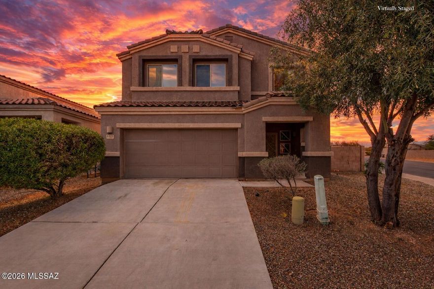 Don't miss this beautiful 5 bedroom, 3 bathroom home on an oversized corner lot with excellent curb appeal. A welcoming foyer opens to bright living spaces featuring luxury vinyl plank flooring and neutral tones throughout. The spacious kitchen offers a breakfast bar, built-in appliances, abundant cabinetry, a walk-in pantry, and generous counter space, ideal for everyday living and entertaining. Upstairs, the grand primary suite includes dual vanities and two walk in closets for exceptional storage. The versatile loft provides space for a home office, playroom, or media room. A downstairs bedroom adds flexibility for guests or multi generational living. The expansive backyard features two covered patios and is ready for your personal touch.