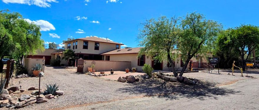 Quality versatile commercial building with an excellent residential component in the Tubac Village. It starts with a large Gallery/Retail space right on Camino Otero with public parking spaces. Then a large comfortable and spacious 3 bedroom, 2 bath home with large private courtyard and double garage. The home has recently been remodeled with all new flooring, wall treatments, lighting, fireplace, and new plumbing throughout. It boasts a chef's kitchen with all new quality appliances, cabinets, counters and a large island. Then, an extra large shop space to create most anything, with high ceilings, double doors, skylights, natural gas and plenty of power. And another rentable space. All of the commercial rental spaces can be broken up into additional rentals. The current configuration has a separate access for each different tenant, commercial or residential with 2 bathrooms. Incredible leasing opportunities exist or can be used as a live / work space that has it all. A must see. Great opportunity for an investor as well.