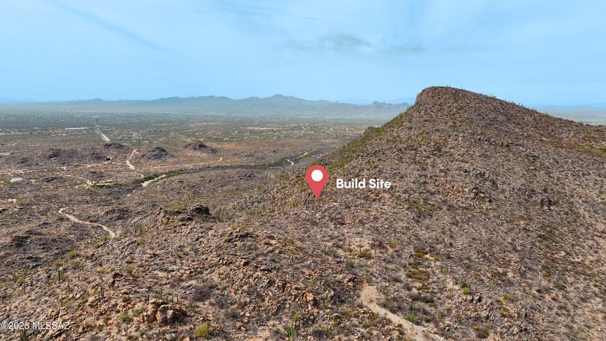 Commanding one of the most striking positions within Saguaro Ranch, Lot 55 showcases the raw beauty and magnitude of the Tortolita Mountains on a grand scale. Elevated and expansive, this estate homesite is surrounded by endless desert, dramatic terrain, and panoramic views that stretch for miles. The sense of space, privacy, and natural power here is unmatched--offering a setting that feels both secluded and extraordinary. Positioned between Dove Mountain and Stone Canyon and accessed through the iconic tunnel entrance, this is a rare opportunity to create a truly one-of-one luxury estate in one of Tucson's most captivating landscapes.
