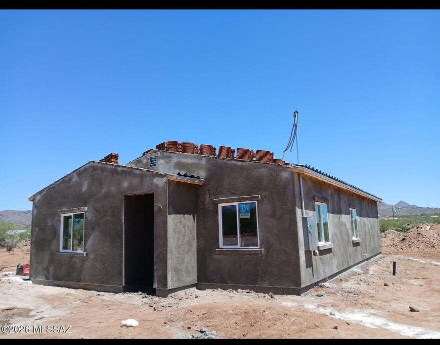 🏡 New Construction in Beautiful Rio Rico! 🏡

Situated on a little over half an acre (0.53 acres), this beautiful new home offers 3 bedrooms, 2 bathrooms, and plenty of space to enjoy.

✨ Spacious primary bedroom and primary bathroom
✨ No HOA
✨ Large lot with room to grow
✨ Estimated completion by the end of June

This home may qualify for USDA financing with 0% down for eligible buyers, making homeownership more accessible than ever.

Don't miss your opportunity to own this beautiful Rio Rico home!

📞 Call Carolina at 520-841-2271 (tel:520-841-2271) to learn more and see if you qualify for 100% financing.

Make this beautiful home yours today! 🏠