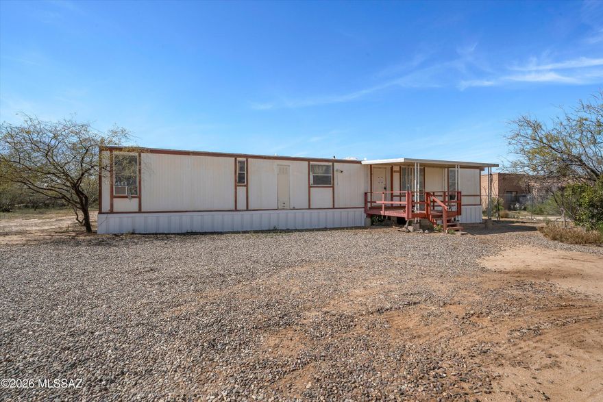 1976 mobile home on an ACRE with tons of potential. This HANDYMAN SPECIAL needs repairs and updates but offers an OPPORTUNITY for investors, flippers, or buyers looking to build sweat equity. SPACIOUS LOT with room for expansion, RV-PARKING or future improvements. Ideal for fix and flip, rental, or owner-occupant renovation. Short-term SELLER FINANCING available with $20,000 DOWN. Great value with strong upside--don't miss this opportunity.
