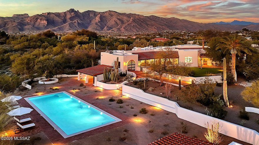 Historic ''Lee Marvin'' Estate designed by master architect Josias Joesler is now FULLY REVITALIZED w/architectural integrity preserved, integrated modern systems & exceptional luxury finishes.Main house features incl new chef's kitchen blending heritage & performance, honed marble surfaces, custom cabs, Wolf range, Sub-Zero fridge, custom lighting, new steel casement window & doors opening to patios & massive views. Reimagined primary suite offers luxurious spa bath w/ soaking tub, marble finishes, deluxe walk-in shower, custom lighting. Courtyard w/ fountain,terraces, white wood beamed ceilings, dramatic city & mountain views, custom entry doors, 2 fabulous full guest houses/studio, custom ironwork, relocated new 60' x 20' pool & much more- **SEE DOCUMENTS SECTION FOR DETAILED LIST**