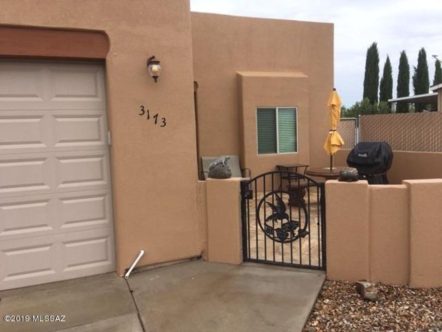 Move-in ready and turn-key! This site-built home in Mescal Lakes has been freshly painted. New water heater, dishwasher, kitchen faucet and new toilets just installed. Enclosed Arizona Room with an attached Bonus room/workshop. Bonus room/workshop has 220 electric and workbench great for hobbies/crafts, projects or art studio, or could easily be turned into a 3rd bedroom/guest quarters. Sale includes adjacent lot APN #124-15-720 for a total of 0.38 acres. Taxes reflect both lots. Priced below market. This one won't last long!