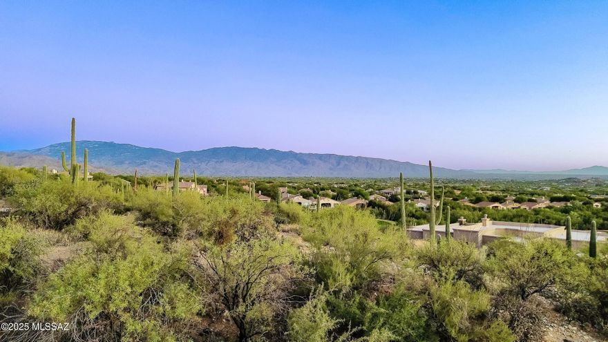 Range Price: $249,900-$259,900. Seller to review offers within the listed price range. An exceptional opportunity to build your dream home in the prestigious gated community of Sabino Estates. This elevated homesite offers breathtaking panoramic views of city lights, surrounding mountains, and stunning sunrise and sunset vistas. Perfectly positioned for privacy and unobstructed scenery, this property captures the beauty of the Sonoran Desert in every direction. As one of the last remaining lots available in this highly sought-after enclave, this is a rare chance to secure a premier location surrounded by custom luxury homes. Utilities are available at the lot line, making it ready for your vision to come to life. Building plans available upon request!