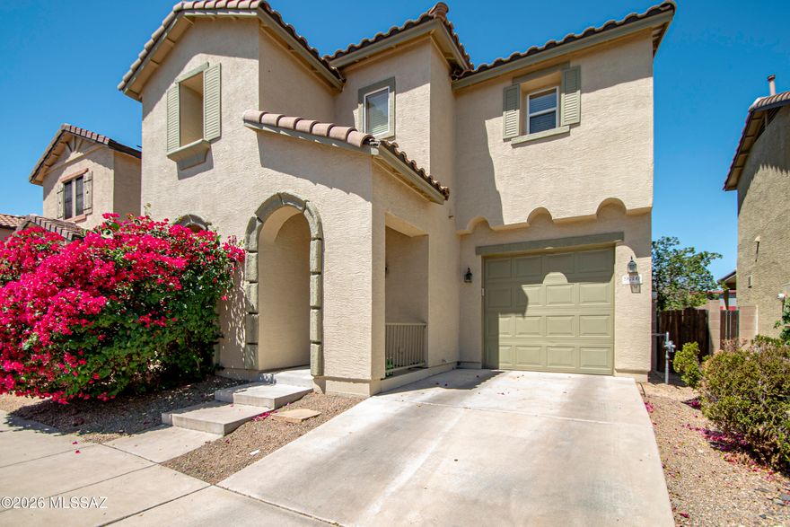 Beautiful 2-story home located on Tucson's desirable East side, close to shopping, restaurants, and everyday conveniences. This 3 bedroom, 3 bathroom home features mostly tile flooring throughout with no carpet, offering easy maintenance and a clean, modern feel. All bedrooms and the laundry room are conveniently located upstairs, along with a versatile loft/den space perfect for a home office, playroom, or additional living area. Enjoy the nicely landscaped backyard with a covered patio, ideal for relaxing or entertaining. The 1-car garage is complemented by additional uncovered parking for extra vehicles or guests. A wonderful opportunity to own a spacious home in a convenient location!