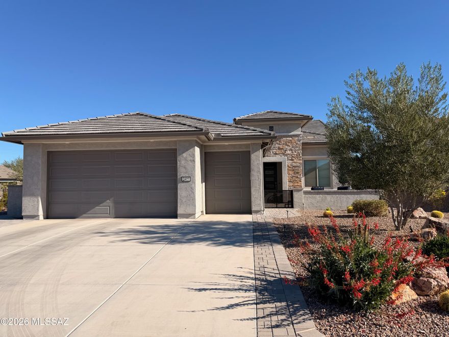 This Quail Creek ''Award Winning'' Mandara Floor Plan is a beautifully appointed 2BR, 2.5 BA home w/Den built on a Premium Golf Course Lot w/perfect orientation and Serene Green Side Views. Inside, the open layout showcases Luxury Vinyl Plank Flooring complemented by Tri-Color Designer Interior Paint, Ceiling Fans, Wine Cooler, Custom Lighting, Quartz Countertops, Gas Range, Farber Exhaust Fan and Striking Counter to Ceiling Backsplash in the kitchen.  Hunter Douglas Power Shades in the Great Room, Custom Closet in the primary BR and Plantation Shutters in the guest BR. The Extended Covered Patio w/Pavers and Power Shades is already plumbed for a Fireplace and 220 Outlet for a hot tub.  Extended 2.5 car garage is complete with Epoxy Flooring and a 220 Volt EV outlet. Why Build New? Builder Upgrades and After Market Upgrade information is available upon request.