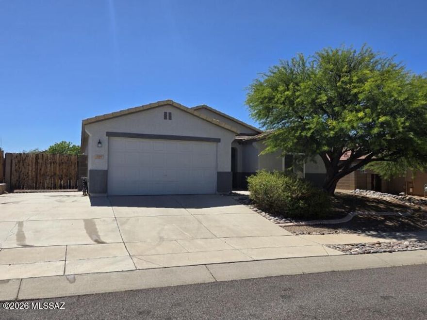 Welcome to this spacious, beautifully designed contemporary home in the desirable Santa Rita Ranch neighborhood. The home features a wide-open, tiled main living space perfect for gathering with family and friends. Notable upgrades include new wood flooring replacing the carpeting throughout the home and freshly painted kitchen cabinetry complemented by light-colored Corian countertops and a breakfast bar. The primary suite offers wood flooring and an expansive walk-in closet, while the primary bath features a double vanity, a tub-shower combo, and ample storage. Additional improvements include all-new dual-pane, vinyl, double-hung windows and a new HVAC system installed in July 2024. The large backyard provides a blank slate for you to make it your own space.