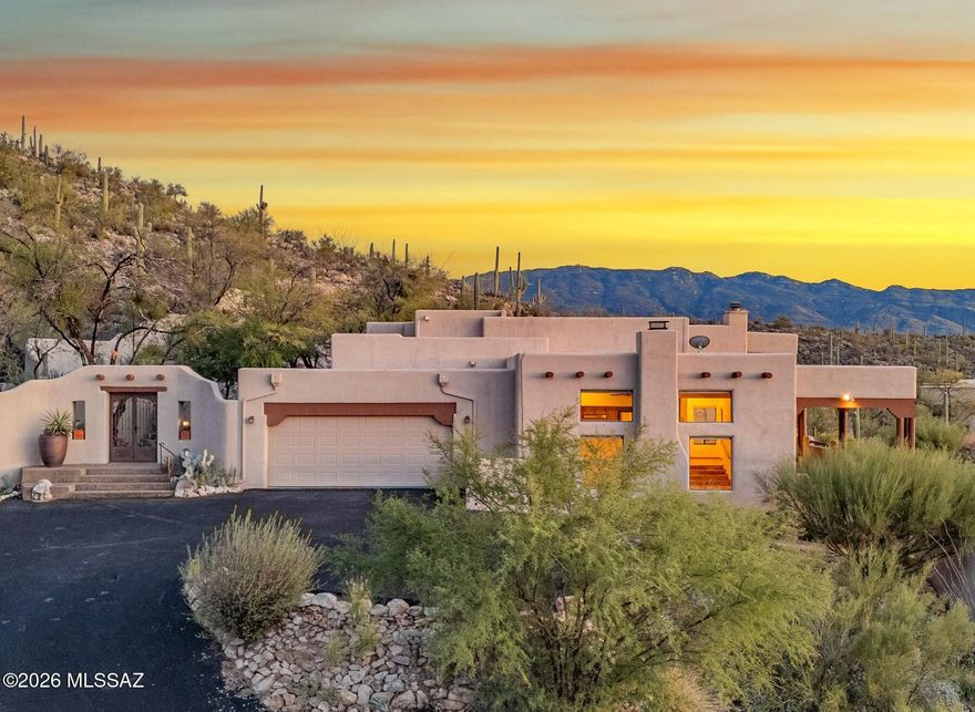 Gated Redington Ranch horse property with spectacular city & mountain views! This 3.2-acre hilltop desert sanctuary offers the ultimate Arizona lifestyle. Horse lovers will enjoy the full-service stable, corral & endless trails. Main home features classic Southwestern finishes: Saltillo tile, viga beamed ceilings & wood-burning fireplaces. Separate guest quarters features a private entrance & kitchenette. Resort-style community amenities include a pool, clubhouse, tennis, pickleball & peaceful pond. Multiple indoor/outdoor living spaces boast a serene waterfall & scenic walkway perfect for entertaining. Don't miss the designated Desert Tortoise retreat! Near hiking, golf, dining & shopping.