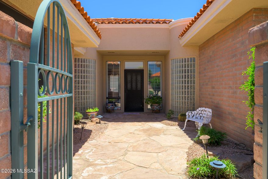 This spacious and versatile home combines comfort, functionality, and scenery in one exceptional package.  Designed with an open layout, this beautiful home features 2 spacious bedroom suites, 2.5 baths, a den, which could be a 3rd BR, separate office, and a family room perfect for relaxing or entertaining.  The oversized kitchen is truly the heart of the home, complete with an island and prep sink, breakfast room, all open in generous living spaces filled with natural light.  Large rooms throughout create an airy, inviting feel.  The front courtyard adds charm and additional outdoor space.  Other highlights include a laundry area in garage, updated maintenance throughout, hardwood doors throughout,  and spectacular mountain vews, which provide a stunning backdrop for everyday living.