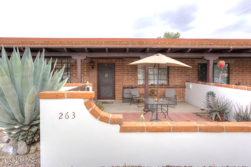 WOW!  Enjoy easy living in this sunny 1 BR, 1 BA Villa, featuring updates throughout.  The kitchen has newer cabinets, while alL flooring adds easy care.  The bath has been updated with a walk-in shower with glass doors--easy in and out!  Convenience is key to this Villa with assigned parking right out front, plus it's a prime location, within walking distance to shops and restaurants.  You can also take advantage of a nearby community pool.  Another savings for this Villa is the fact that it does NOT have Green Valley Rec. membership.  That's a great savings, and if you want it later, you can add it.  Whether you're looking for a winter retreat or a  year-round home, this well-maintained Villa offers the best of both worlds.  Many to choose from, but come choose the best one!  FURNISHED!!