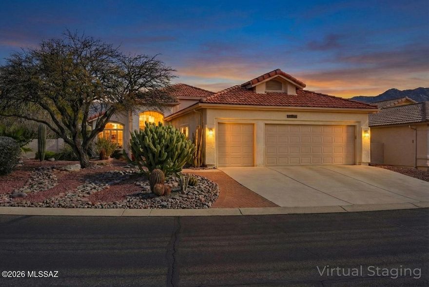 Seller Highly Motivated! Turnkey Ventana model with 1,878 sq ft, 2 bedrooms, 2 baths on a desirable corner lot with mountain views. Recently added Arizona Room enhances living space and natural light. Updated kitchen features granite countertops, breakfast bar, and breakfast nook. Tile and LVP flooring throughout, soaring ceilings, skylights, and plantation shutters add style and brightness. Guest room includes a Murphy bed. Primary suite offers patio access with remote screens. Spacious 2.5-car garage with golf cart space and cedar closet. Citrus trees include grapefruit and pomegranate. Roof underlayment replaced in 2024, HVAC 2019, Kinetica water softener system, and updated irrigation system.