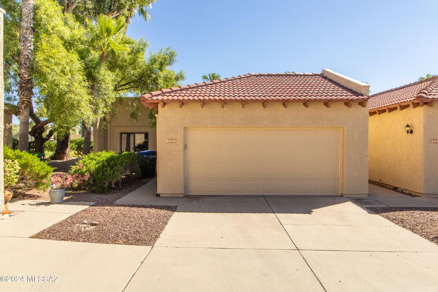 Beautiful end unit townhome with 2 car garage move in ready. Features newer stainless steel appliances, updated Kitchen, newly painted interior and carpets, new water heater, finished brick fireplace, upgraded lighting and ceiling fans throughout home, and much more. 2 car garage with sealed flooring, work bench, custom cabinets, and extra ceiling fans and lighting. Landscaped rear yard with pavers and river rocks along back garden. Newer roof with reflective white coating for energy efficiency. A MUST
SEE!
