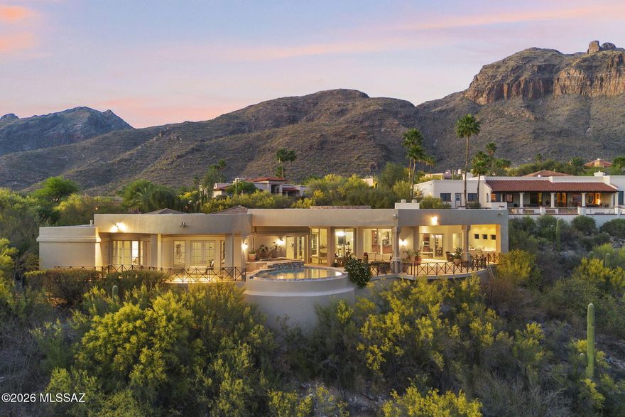 Perched in the prestigious Cobblestone community of the Catalina Foothills, this stunning 3-bedroom, 4-bath residence delivers breathtaking mountain and city views from every bedroom. Designed for effortless indoor-outdoor living, the home features a dramatic wrap-around patio, full outdoor kitchen, a private pool and spa that overlook glittering city lights--perfect for entertaining or relaxing through Sonoran Desert sunsets.

Interior highlights include an open floor plan with seamless flow to the outdoor living areas, well-appointed primary suite with panoramic views and spa-like bath, chef-ready kitchen, and generous secondary bedrooms each with en suite or access to full baths. High-end finishes, tasteful appointments, and abundant natural light complete the picture. Location:
Minutes to fine dining, boutique shopping, and La Paloma Country Club. Easy access to hiking and outdoor recreation in the Catalina foothills.

Features & Highlights:

3 bedrooms, 4 bathrooms
3-car garage
City and mountain views from every bedroom
Resort-style pool & spa overlooking the city
Full outdoor kitchen and covered, wrap-around outdoor living
Ideal layout for entertaining and sunset viewing
Located in the Cobblestone community of the Catalina Foothills
Minutes to dining, shopping, and La Paloma Country Club