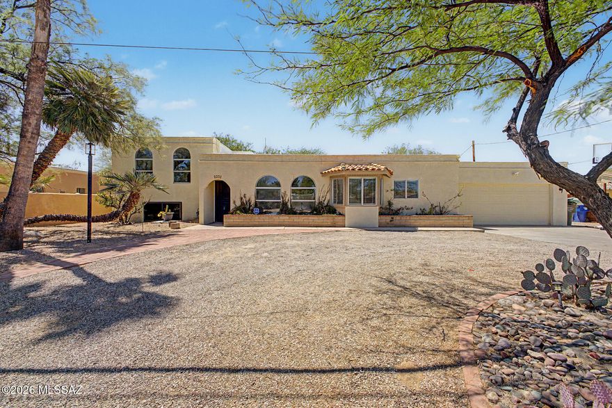The search is finally over! This lovely 5-bedroom home welcomes you with a 2-car garage, a circular driveway, and a charming desert landscape. Discover an inviting living/dining room with a wood-feature wall, classic plantation shutters, and wood-look flooring. The kitchen has a breakfast nook, ample wood cabinets, built-in appliances, and a handy pantry. You'll also find a dedicated family room with a cozy fireplace for relaxing evenings. The primary bedroom includes soft carpeting, a private bathroom, and a walk-in closet. You'll be delighted by the attached casita with separate access, boasting a well-equipped kitchen, living area, bedroom, and bathroom. Venture out onto the backyard, showcasing a screened patio and a sparkling pool for refreshing dips. Make it yours today!