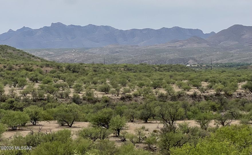 Build your dream home on this beautiful desert homesite tucked away on a peaceful cul-de-sac with stunning mountain views and breathtaking Arizona sunsets. Enjoy the serenity of desert living while still being conveniently located near nearby amenities. Water, and electricity are available. The property has been flagged, making it easy to envision your future build. A rare opportunity to create your own private desert retreat surrounded by natural beauty and wide-open views. Buyers to confirm utilities.