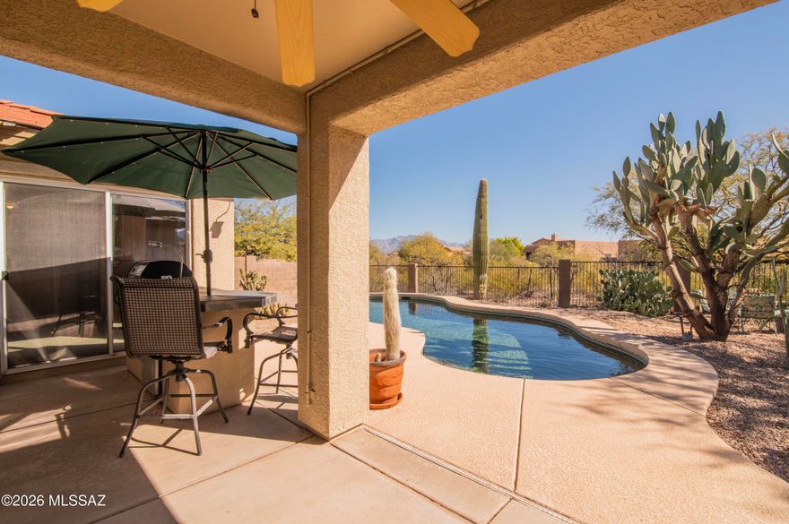 Multiple offers received, seller will be reviewing offers 2/14. Situated on a cul-de-sac in the desirable Continental Reserve community. 3BD, 2BA home with a pool and built-in BBQ! Covered front entry invites you to an open floor plan with bamboo flooring throughout the main living areas. Spacious primary suite w/ a walk-in closet, dual vanity, soaking tub with shower, and a glass slider providing direct access to the backyard. The kitchen offers ample cabinet storage with lower pull-outs and a walk-in pantry. The backyard features a covered patio with misters, Pebble-Tec pool, mountain views, and a built-in BBQ area with outdoor refrigerator, all overlooking open desert with no rear neighbors for added privacy. Move-in-ready with fresh interior and exterior paint, new carpet, wrought iron entry door, french patio doors w/ built-in blinds,water softener system, HVAC 2019 and an upgraded tankless water heater installed in 2013. Enjoy the community's low HOA fees and a variety of amenities, including tennis, pickleball, basketball, and baseball fields, as well as parks and direct hiking access to Sombrero Peak from the neighborhood. Minutes away from shopping, dining, gyms, community events, and the movie theater with easy access to I-10. Don't miss this, NEVER before on the market - Original owner! Schedule your showing today.