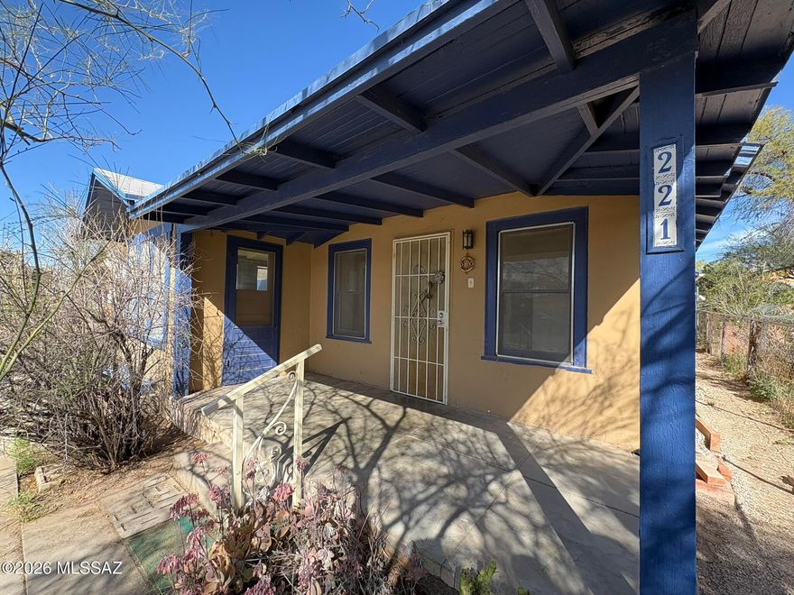 Affordable and adorable vintage home close to the U! Charming 1925-built 2 bed/1 bath bungalow in historic Feldman's Neighborhood Schumaker Addition. Walk to 4th Ave or the U of A. Wood floors. Unusually large primary bedroom with 2 closets and a private patio. Sunny second bedroom. The front porch is covered, and the perfect spot to chat with neighbors. Dedicated laundry casita is just outside the back door, off the large covered patio. Decent-sized corrugated workshop way in the back. Super deep 150 ft, C2-zoned lot allows for many uses. This property is possibly the most perfect candidate for adding an ADU/Guest House. Currently heated with space/wall heaters, and cooled with evap cooling. Range priced 249,200 to 266,000. Seller will install new HVAC with AC with full priced offer. See estimate in attached documents.

Call for an appointment today!