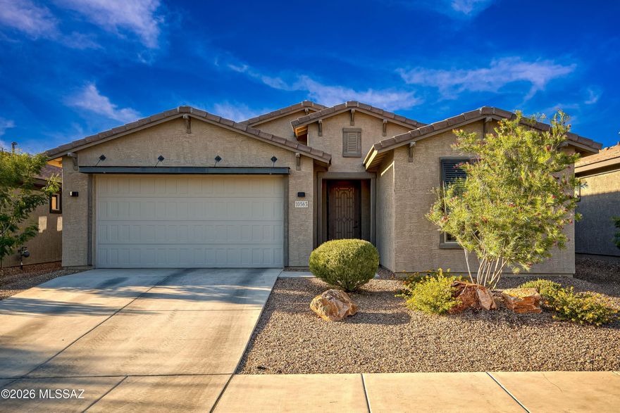 Welcome to this beautifully upgraded 3-bedroom, 2-bath home in the gated Houghton Reserve community! Situated on a premium lot with stunning views, this home offers both comfort and style. The gorgeous kitchen features quartz countertops, a large island, and abundant space for cooking and entertaining. The spacious primary suite includes a walk-in closet and a luxurious bath with a soaking tub and separate walk-in shower. A versatile bonus room is perfect for a home office, den, or formal dining area. Additional upgrades include 4-foot extensions to the garage and front bedroom, pre-plumbing for a water filtration system, and EV wiring in the garage. A rare opportunity to own a move-in-ready home in one of the area's most desirable gated communities!