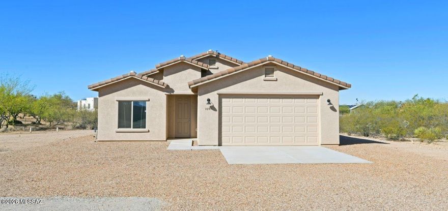 Acreage home • Horse property • RV parking • No HOA • Open floor plan • Vail School District • Move-in ready.
Skip the wait for new construction and own this like-new home on over 1 acre in desirable Vail, Arizona with beautiful desert and mountain views.
Inside, you'll find an amazing open floor plan with 9-ft ceilings, wood-look tile flooring, ceiling fans throughout, and abundant natural light. The spacious kitchen is designed for entertaining with granite countertops, a huge center island, stainless steel range and microwave, and ample cabinet space--perfect for cooking, gathering, and everyday living. The primary suite retreat features a walk-in closet, dual-sink vanity, ensuite bath, and private sliding glass door to the covered patio. A second set of sliding doors from the great room extends the living space outdoors for seamless indoor-outdoor living across the full-length back patio.
This 1+ acre lot is zoned for horses, RVs, trailers, and recreational vehicles, with plenty of room to build a workshop, guest house, garage, barn, or additional structure. Enjoy the flexibility of acreage living, horse property, RV property, and no HOA restrictions.
Located in the highly rated Vail School District and conveniently close to shopping, dining, medical facilities, and quick access to Interstate 10 for an easy commute to Tucson, Arizona. Potential Short Sale