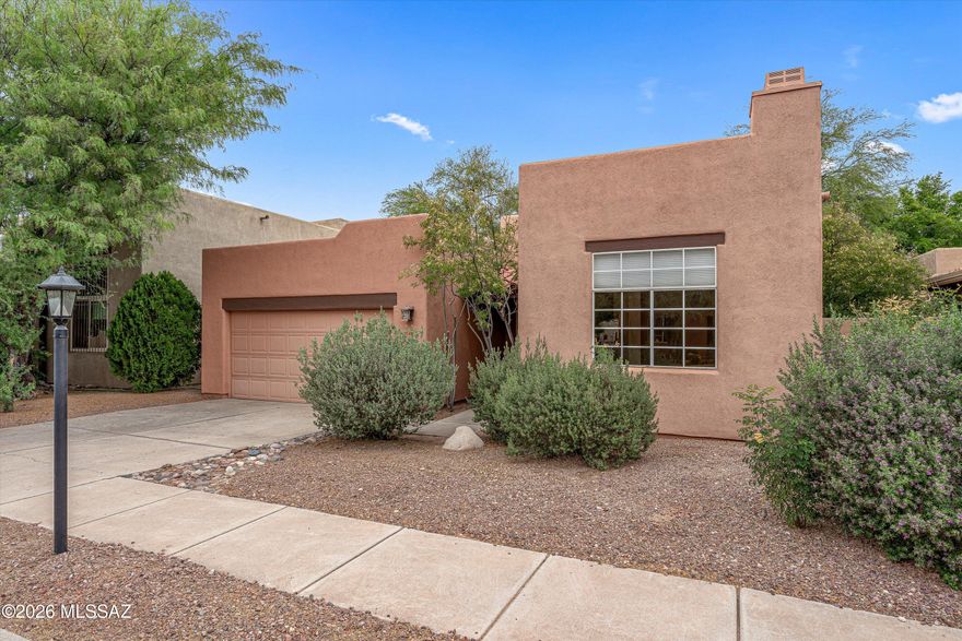 Welcome to this 3 bedroom, 2 bath home in the heart of central Tucson, perfectly situated within walking distance to the Tucson Racquet Club and The Loop. Just minutes from the University of Arizona and the vibrant Campbell Corridor, you'll love the easy access to top restaurants, shopping, and everyday conveniences.  Inside, the home feels bright and airy with high ceilings and abundant natural light. Bamboo flooring adds warmth to the living spaces, while classic Saltillo tile in the kitchen and bathrooms bring character and Southwestern charm. A screened-in patio offers the perfect spot to relax or entertain year-round. Thoughtful updates include a new HVAC system in 2023 and a roof recoat in 2026.