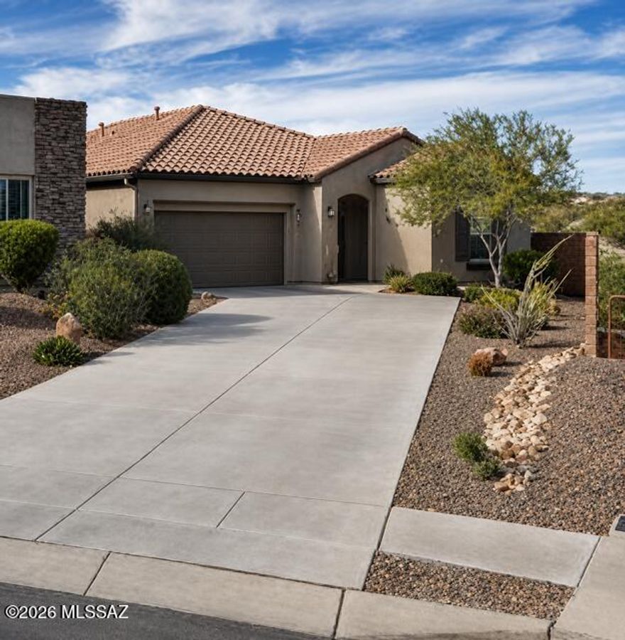 Located in the highly desirable Rancho Vistoso community of Oro Valley, this beautifully maintained 3 bed, 2 bath home built in 2021 offers the perfect blend of modern style and Arizona outdoor living. The open-concept floorplan features spacious living areas filled with natural light, creating an ideal space for both entertaining and everyday comfort.

Step outside to your own private backyard retreat complete with a heated pool, gas firepit, and stunning mountain views -- perfect for relaxing or hosting guests year-round. Conveniently located near shopping, dining, golf courses, and scenic hiking trails, this home offers the very best of the Oro Valley lifestyle.