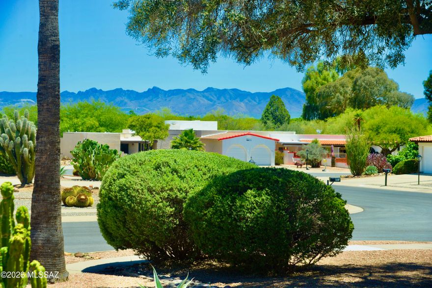 Quaint & charming 2 bed 2 bath home offers 1965 sq ft of inviting living space in a peaceful 55+ community. The welcoming front courtyard with mountain views sets the tone for the Southwest charm found throughout. Tucked back in a quiet cul-de-sac, this home offers privacy and comfort with room to spread out. An additional living room filled with natural light and walls of windows creates the perfect artist's retreat, entertaining space, or cozy gathering room. Bonus flex space off the primary bedroom is ideal for a home office, workout room, or private sitting area. Recent updates include a 2022 HVAC system, 2022 roof recoat tankless water heater, upgraded electric panel! Conveniently located near shopping, GVR centers, dining, shopping and highway.