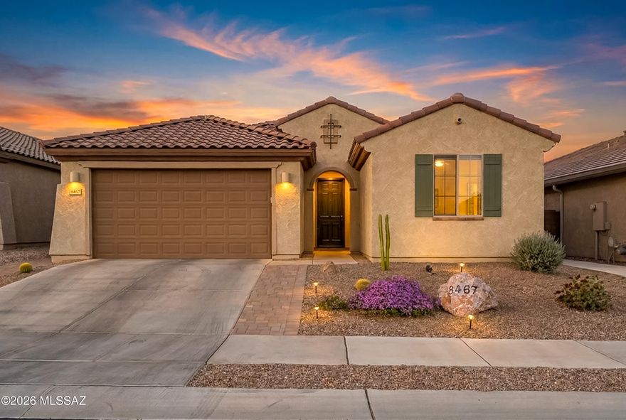 Tucked inside the gated community of Lazy K Bar Ranch near the base of Sombrero Peak and just minutes from Sanctuary Cove, this beautifully updated home captures sweeping mountain views and unforgettable Arizona sunsets. Thoughtful farmhouse-inspired details shine throughout, from the light-filled open layout to the fresh tile and soft neutral tones. The chef's kitchen features custom cabinetry, stainless appliances, walk-in pantry and an oversized island with bar seating. Two spacious primary suites include updated baths with dual vanities. A 2.5-car garage offers room for projects, storage, or toys-an exceptional find in a premier setting.