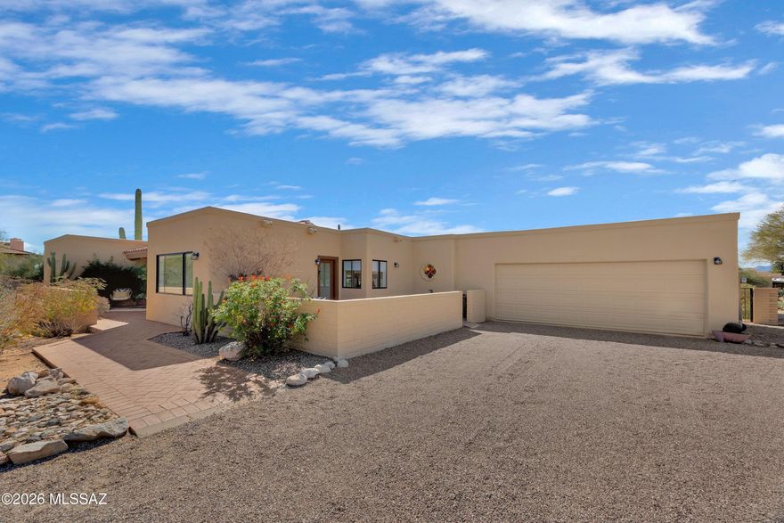 Stunning! Fully remodeled 3-bedroom, 3-bath home in Shadow Hills, one of the Catalina Foothills most established neighborhoods within the A+ rated Catalina Foothills School District. Set on a quiet cul-de-sac, this inviting residence blends contemporary updates with its desert surroundings. The updated kitchen & bathrooms feature new cabinetry, quartz countertops, modern fixtures, appliances, and tile flooring throughout-offering timeless style and easy maintenance. Classic lines, vaulted beamed ceilings, &  bright, open spaces create a seamless flow throughout the interior. Outside, a sparkling pool and cozy patios provide ideal settings for entertaining or relaxed living. This is an exceptional opportunity for a family or those embracing a simpler chapter to enjoy the best